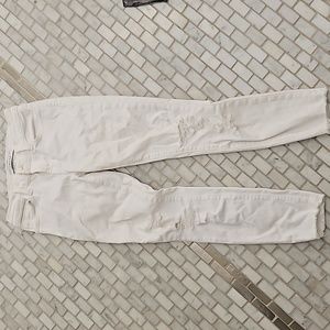 White distressed cut out jeans